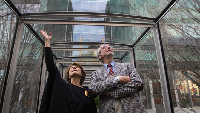 Anne Hawley walks through a spectacular glass tunnel connecting the Gardner Museum's new wing to the
original building.