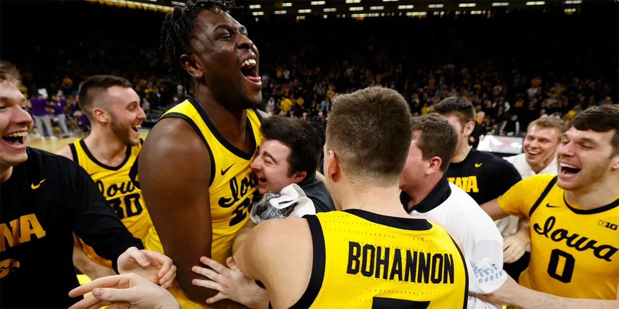 Jack Devlin celebrates with the Iowa Hawkeyes