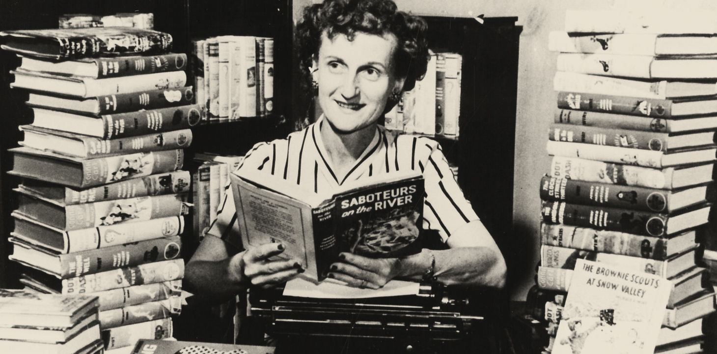 Mildred Wirt Benson at a desk