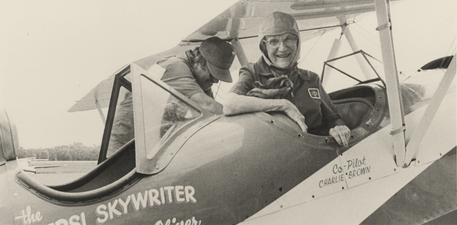 Aviator Mildred
Wirt Benson sits in
the cockpit of a plane