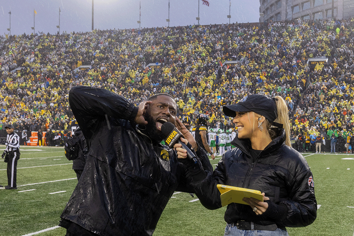 Big E and Laura on field