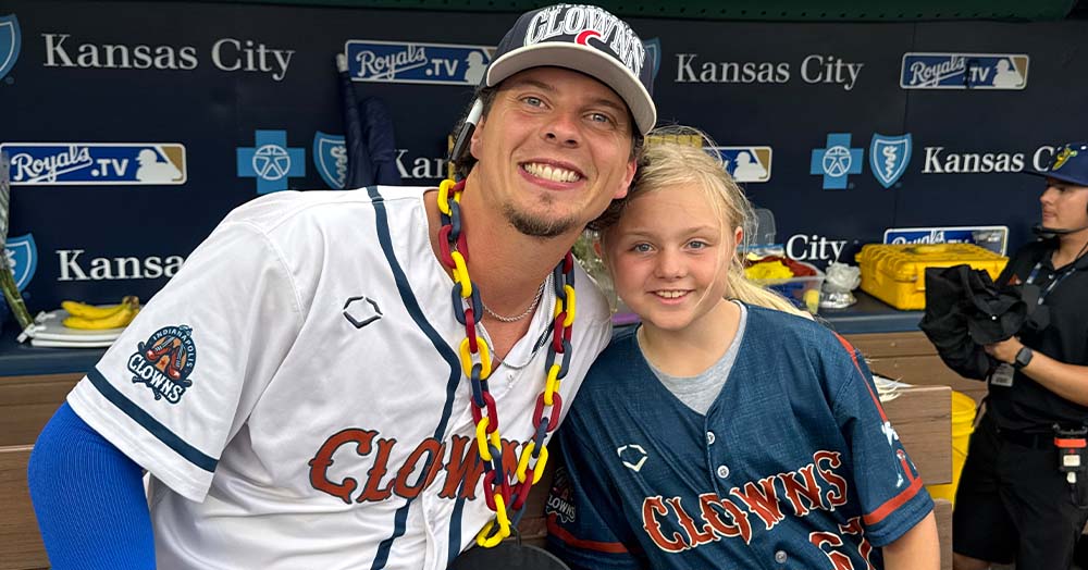 Drew Irvine with a young fan