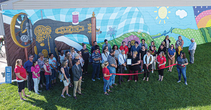 Students in front of mural