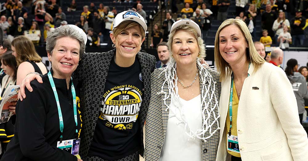 Beth Goetz with P. Sue Beckwith, Jan Jensen and Lisa Bluder