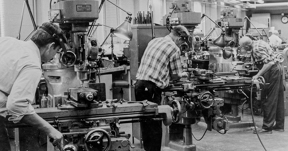 The UI Department of Physics and Astronomy machine shop prepares the plasma wave subsystem instrument case for Voyager ahead of the 1977 launch.