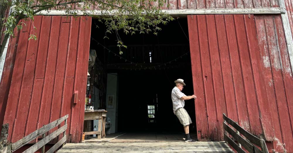 Tyler closes the barn doors