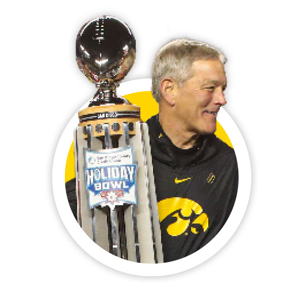 Coach Ferentz with trophy